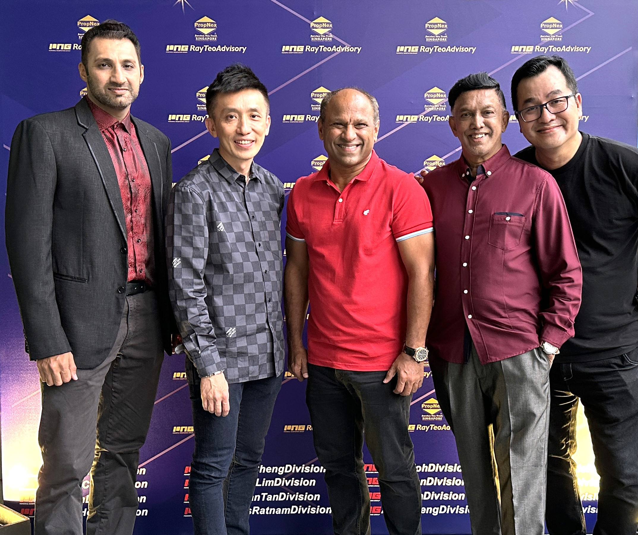PropNex Leadership Group Photo at Corporate Event Roger khera Standing with Kelvin fong, Ismal Gafoor and team